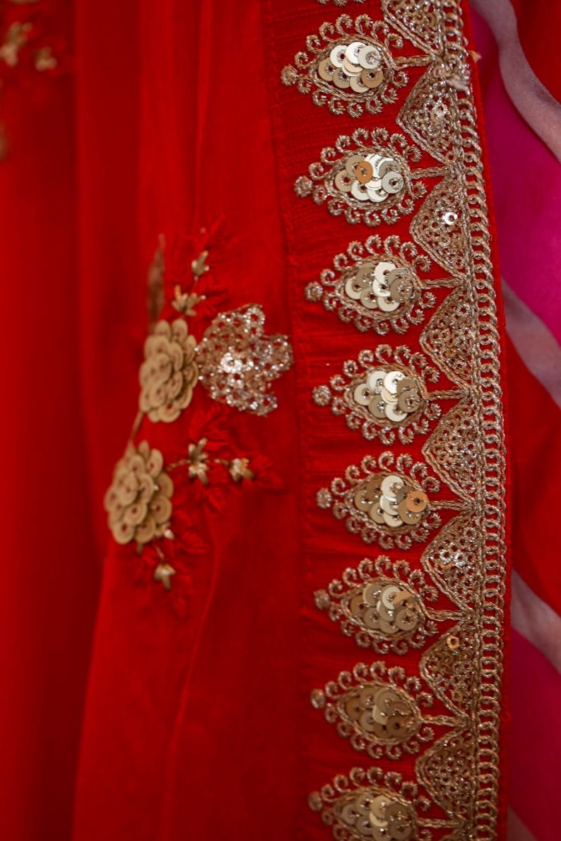 Lehereya kurta hand painted to form the lehereya pattern; adorned with intricate ari and sequin hand work.