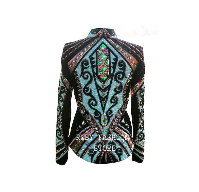 May include: A black and light blue long-sleeve jacket featuring intricate black scrollwork patterns, a high collar, and dense embellishments of iridescent crystals. The text RUBY FASHION STORE is printed in white on the lower front of the garment.