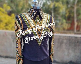 May include: A black long-sleeve shirt featuring a high collar and intricate geometric patterns created with gold, green, and clear crystals. The text Ruby Fashion Store Etsy is overlaid on the front of the garment, which is displayed on a mannequin.