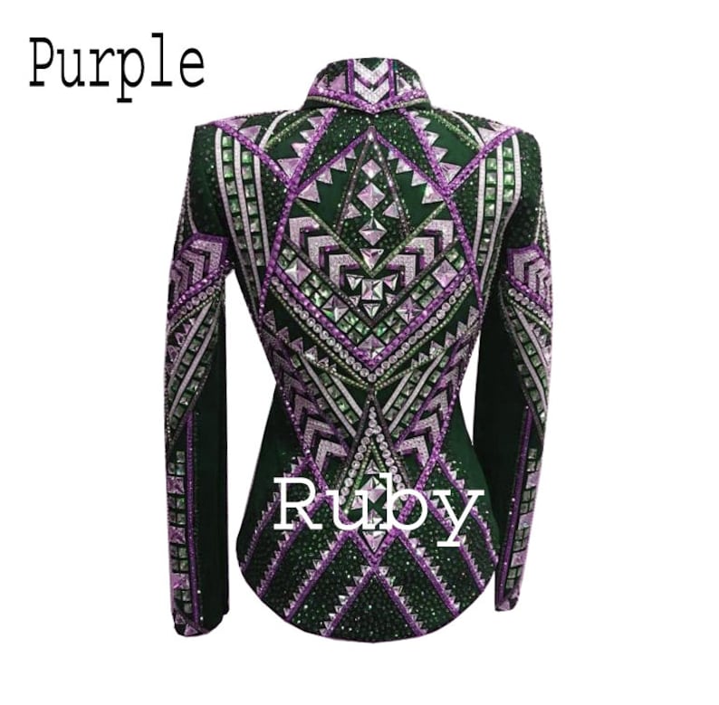 May include: A dark green long-sleeved jacket featuring intricate geometric patterns in purple and white, heavily embellished with numerous crystals and studs. The text "Purple" and "Ruby" is printed on the image. The jacket has a high collar.