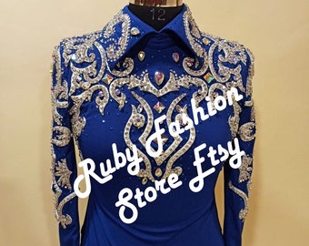 May include: A royal blue long-sleeved shirt with a white and silver rhinestone design. The shirt has a collar and is embellished with rhinestones. The text "Ruby Fashion Store Etsy" is visible on the shirt.