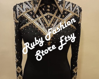 May include: Black show shirt with gold and silver embellishments. The shirt has a geometric pattern and a collar. The text "Ruby Fashion Store Etsy" is visible on the shirt.