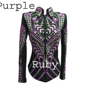 May include: A long-sleeved jacket featuring a high collar and a front zipper closure. The garment is decorated with an intricate geometric pattern of purple, green, and clear crystals set against a dark fabric. The text Purple and Ruby is visible.
