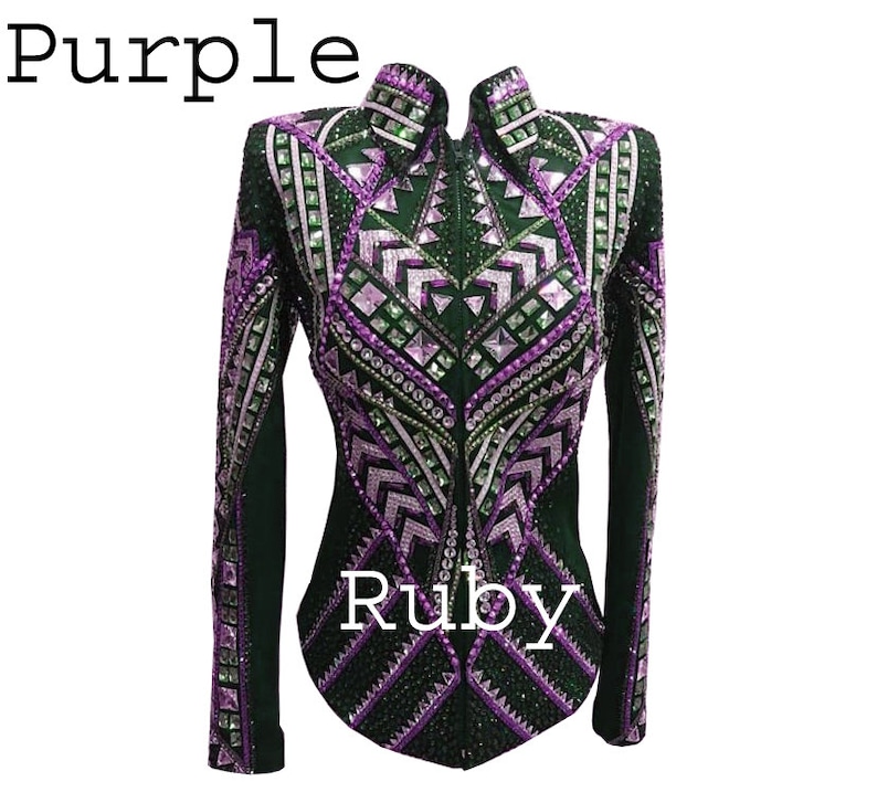 May include: A long-sleeved jacket featuring a high collar and a front zipper closure. The garment is decorated with an intricate geometric pattern of purple, green, and clear crystals set against a dark fabric. The text Purple and Ruby is visible.