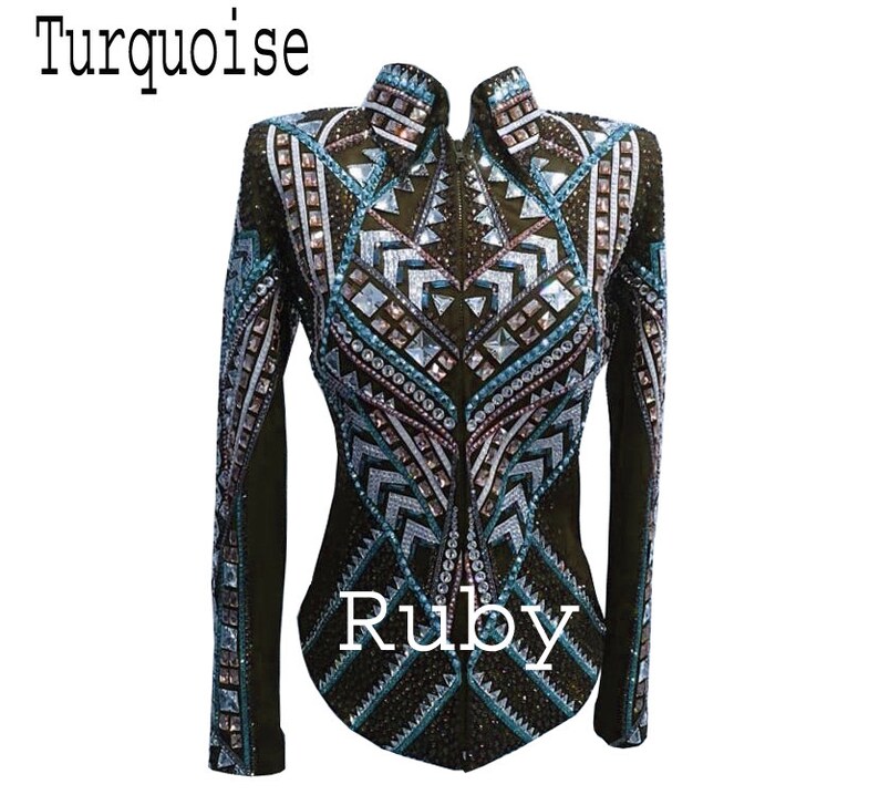 May include: A dark brown long-sleeved jacket featuring a high collar, a full-length front zipper, and intricate geometric patterns embellished with turquoise, silver, and clear crystals. The text Turquoise and Ruby appear on the image.