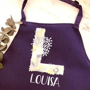 Children's apron personalized with initial and name, for baking, crafts and gardening desired name and 6 colors floral 7-10 lila