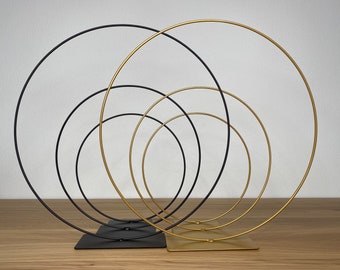 Metal ring with stand - 3 sizes, black and gold, decorative diameter 25, 30, 40 cm. Matte coated metal ring, freestanding, black on stand.
