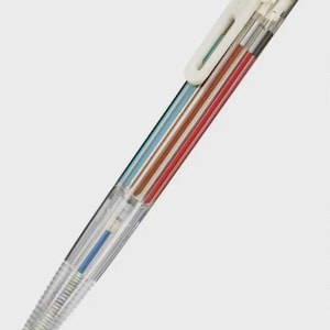 May include: A clear multi-colour pen with a white clip and top. The pen contains blue, brown, red, and teal ink cartridges. The pen tip is silver and the ink is blue.