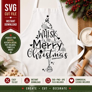 May include: A white apron featuring a black graphic design shaped like a Christmas tree. The text reads We Whisk You A Merry Christmas, accompanied by illustrations of a whisk, a cupcake, and stars. The design is centered on the fabric.