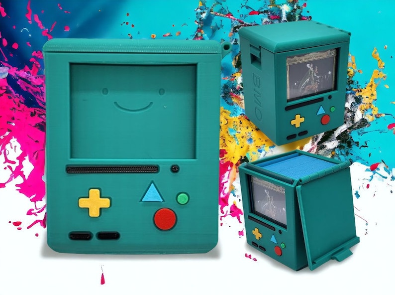 May include: A teal blue 3D printed box shaped like a retro video game console with a smiling face on the screen. The box is open to reveal a compartment for storing cards. The box is labelled "BMO" on the side.
