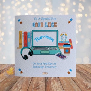 May include: A square greeting card with the text "To A Special Son, Good Luck, Harrison, On Your First Day At Edinburgh University, 2025." The card features a laptop, books, headphones, a coffee cup, a phone, and star accents.