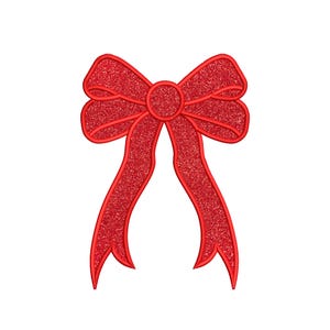 May include: A red glitter bow with a large center loop and two long tails.