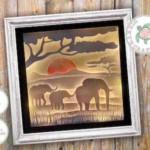 May include: A digital download of a layered paper craft design featuring three elephants silhouetted against a sunset in an African savanna. The design is perfect for creating a 3D shadow box or a layered paper art project.
