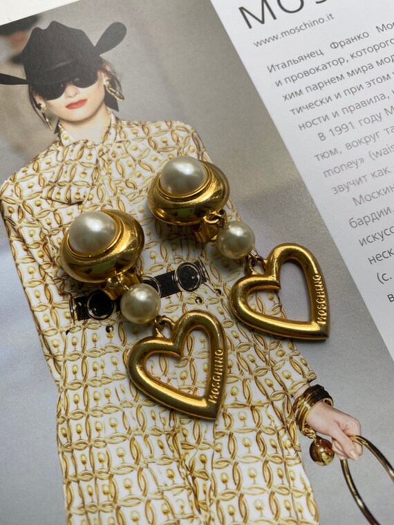 Moschino clip on earrings