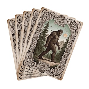 May include: A collection of vintage-style playing cards. Each card features a Bigfoot illustration within an ornate border. The cards show the creature walking through a forest under a night sky with a full moon.