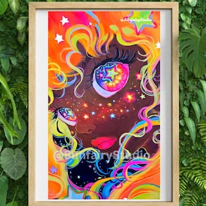 May include: A framed art print featuring a vibrant, colorful illustration of a face with long, flowing hair in neon shades of orange, yellow, and pink. The eyes contain star patterns, and the skin is dark with glowing star-shaped freckles. Text reads @SunfairyStudio.