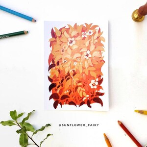 May include: An artwork featuring a vibrant floral arrangement in shades of orange, yellow, and red, with small white flowers. The painting is on a white background, surrounded by colored pencils, a sprig of leaves, and a gold wax seal.