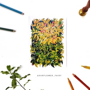 May include: A watercolor painting of a bush with yellow and green leaves. The painting is surrounded by colored pencils, a sprig of leaves, and a wax seal. The text "@SUNFLOWER_FAIRY" is at the bottom of the painting.