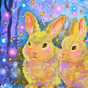 May include: A colorful painting of two yellow rabbits with pink cheeks and ears. The rabbits are set against a backdrop of a starry, purple and blue night scene with trees and snow.