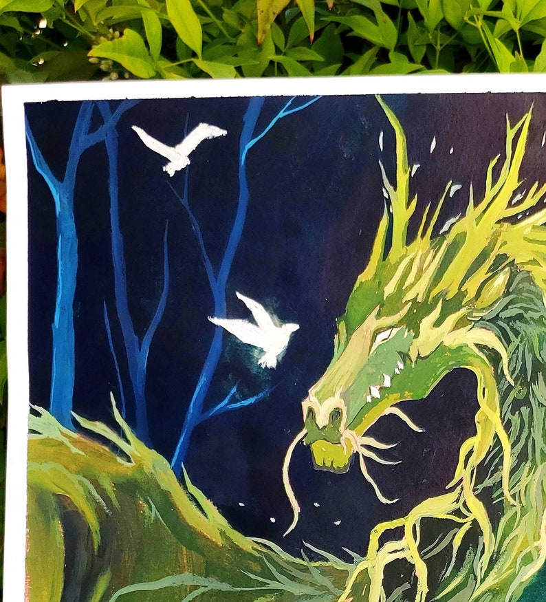 May include: A vibrant painting of a green dragon with yellow accents, set against a dark blue forest background. Two white birds fly near the dragon's head. The artwork has a fantasy theme.