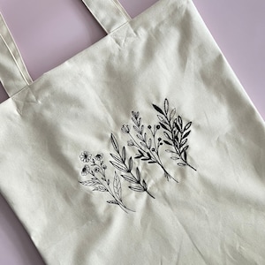 Reusable Handmade Canvas Tote Bag with Trendy Embroidered Wildflower and Floral Books Design  - Ecofriendly Gift for Book Lovers - Pocket
