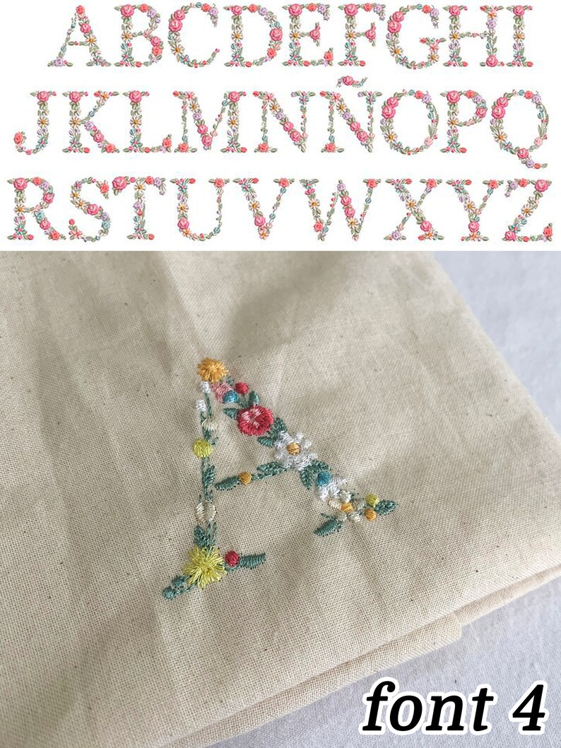 Puede incluir: Primer plano de la letra A bordada con flores de colores sobre una tela beige. La tela est&aacute; doblada y el texto "font 4" es visible en la parte inferior de la imagen.