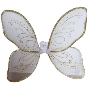 May include: White fairy wings with gold glitter and a delicate design. The wings are made of a sheer fabric and have a wire frame for support.