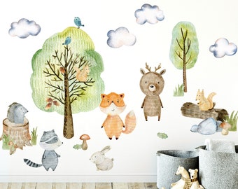 May include: Watercolor woodland animal wall decals featuring a deer, fox, raccoon, squirrel, and hedgehog. The decals are perfect for a nursery or child's room.