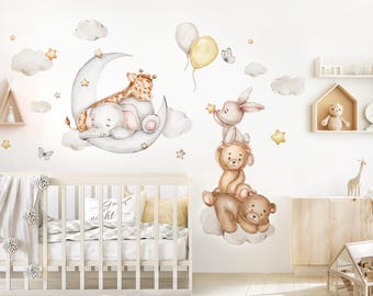 May include: A nursery wall decal set featuring a sleeping elephant and giraffe on a crescent moon, and a stack of three bears with a bunny on top. The decals are in a watercolor style with soft colors and are perfect for a baby's room.