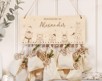 May include: Wooden advent calendar with engraved woodland animal illustrations and the name "Alexander". Features small fabric bags with wooden number tags, perfect for a festive countdown. Includes a string for hanging.