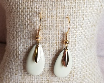 cream earrings