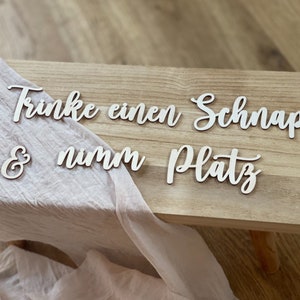 Schriftzug Finde deinen Platz aus Holz Bild 7