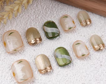 Green Cat Eye Nails with White Flowers and Golden Liner, Short Coffin Press-ons, Perfect for Birthday,Summer