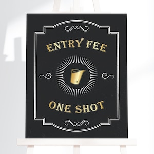 May include: A white ceramic mug with a black handle and the text "But First, Coffee" in a black, bold font. The mug is on a white surface. The mug is approximately 4 inches tall.