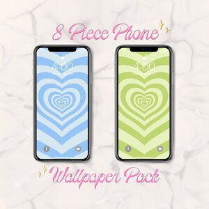 Könnte beinhalten: Zwei Smartphones mit herzförmigen Hintergrundbildern. Eines zeigt ein hellblaues Herzdesign, das andere ein grünes Herz. Der Text "8 Piece Phone Wallpaper Pack" steht in rosa Schrift über und unter den Telefonen.