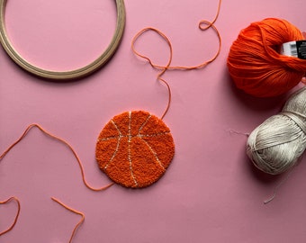 Punch needle ballon de basket