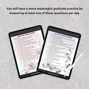 May include: Two digital tablets with floral designs on the screen. The tablets display a list of gratitude prompts, titled "Gratitude Prompts 76-100" and "Gratitude Prompts 126-150".