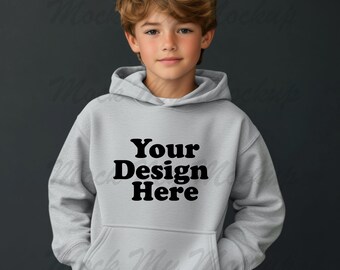 Może przedstawiać: Szara bluza z kapturem z nadrukiem "Your Design Here" w kolorze czarnym na przodzie.