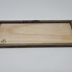 May include: A rectangular wooden sign with a dark brown frame and a light wood surface. The sign is blank and ready to be customized.