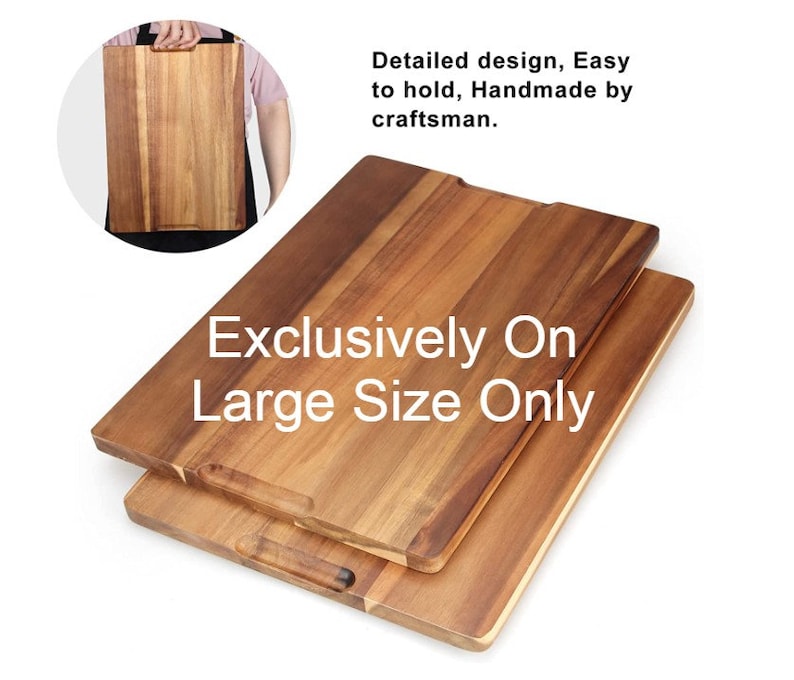 May include: Two wooden cutting boards, one on top of the other. The top board is larger and has a handle on each side. The bottom board is smaller and has a handle on one side. The boards are made of light brown wood and have a natural finish. The text "Exclusively On Large Size Only" is printed on the boards.