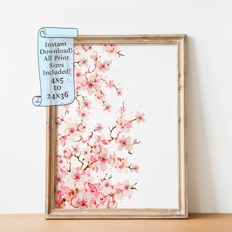 Puede incluir: Una pintura de acuarela enmarcada de una rama de cerezo en flor con flores rosas y fondo blanco. El texto "Descarga instant&aacute;nea! Todos los tama&ntilde;os de impresi&oacute;n incluidos! 4x5 a 24x36" est&aacute; en un rollo azul en la esquina superior izquierda de la imagen.