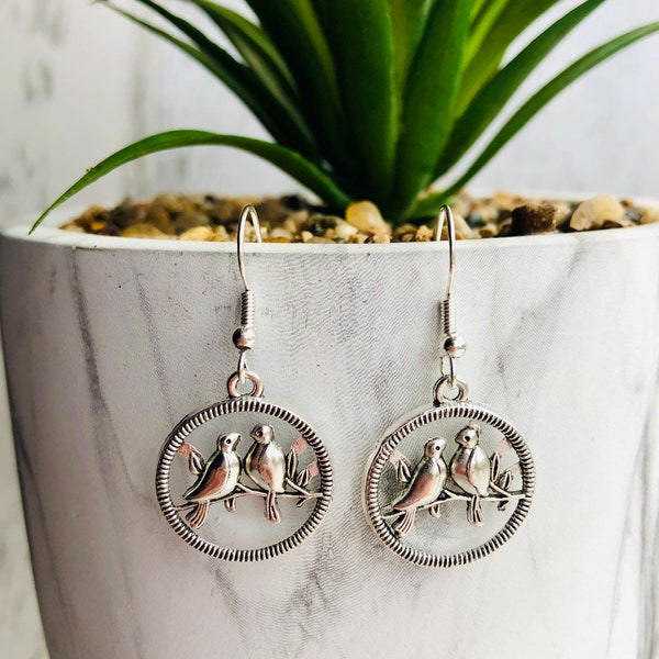 Love birds, two birds of a feather silver drop earrings , bird earrings, birds on perch