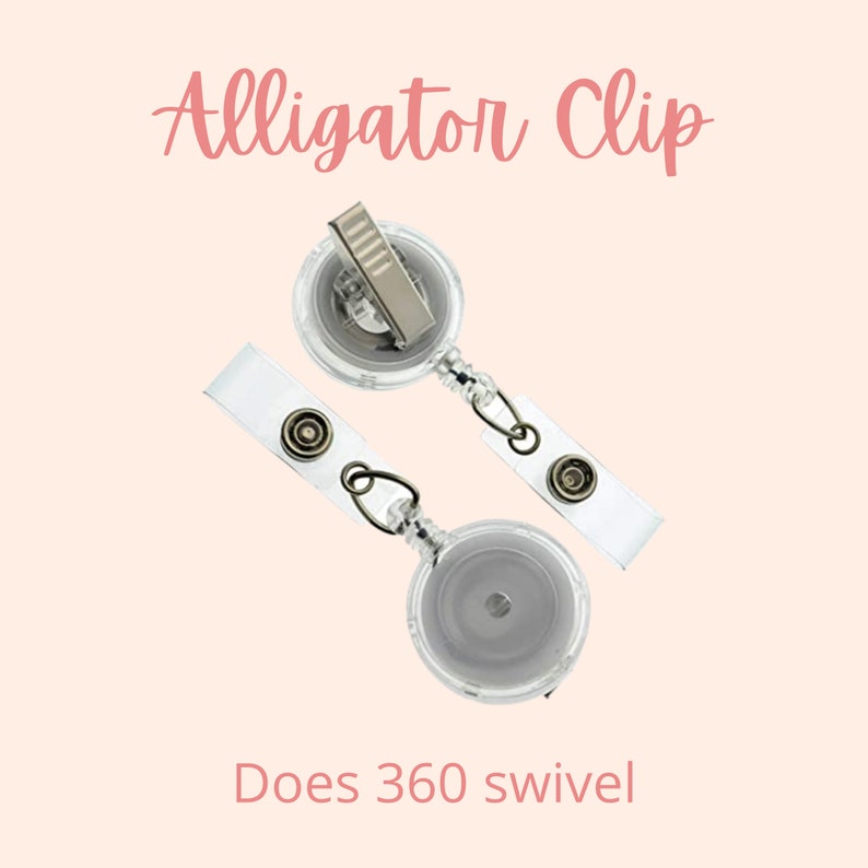 May include: Two clear retractable badge holders with alligator clips. The holders have a silver clip and a clear plastic reel. The text "Does 360 swivel" is printed below the holders.