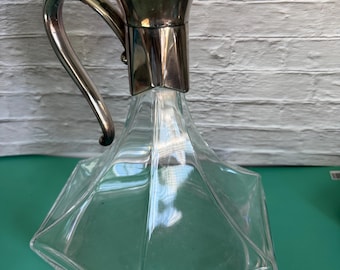 Decantador vintage RCR con tapa bañada en plata
