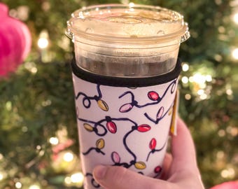 Fundas para tazas de café con luces navideñas