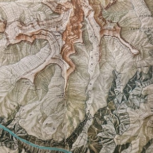 May include: A detailed map of a canyon with a river running through it. The map shows the names of various points of interest, including Bradley Point, Demarty Point, and Zoroaster Temple. The map also shows the elevation of different points in the canyon.