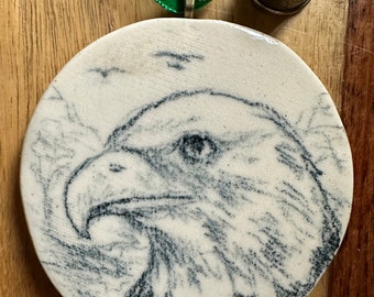 Artist Drawn Bald Eagle on Handmade Ceramic Circle Ornament, 3" across, .25" high, cork backed, ribbon, ready for a Christmas tree