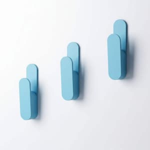 Modern minimalist adhesive wall hooks - no drill storage solution