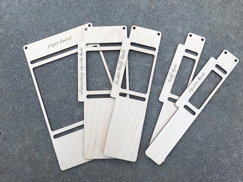 May include: A set of five light-colored wooden macrame project boards with cut-out rectangular centers and pre-drilled holes. The boards are engraved with the text project board, alternating square knot, double half hitch, half knot, and square knot.