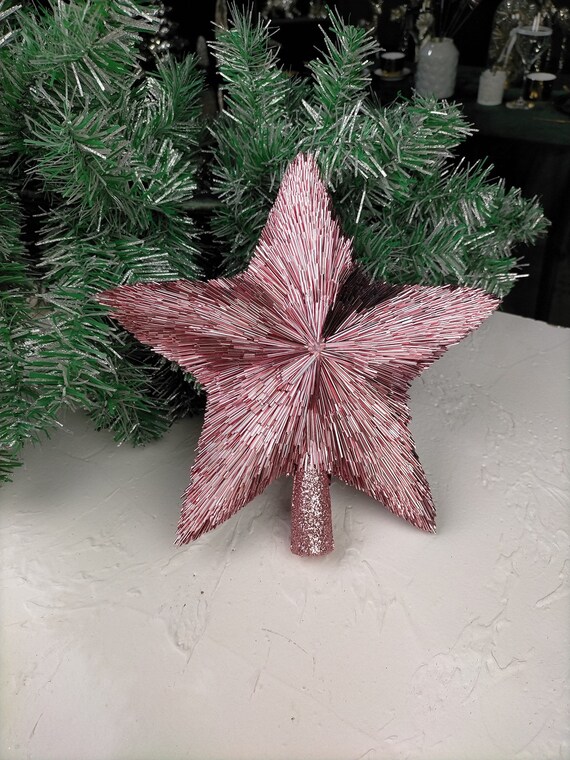 Pink tree topper deals